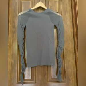 Free people intimately long sleeved top with sheer mesh sleeves